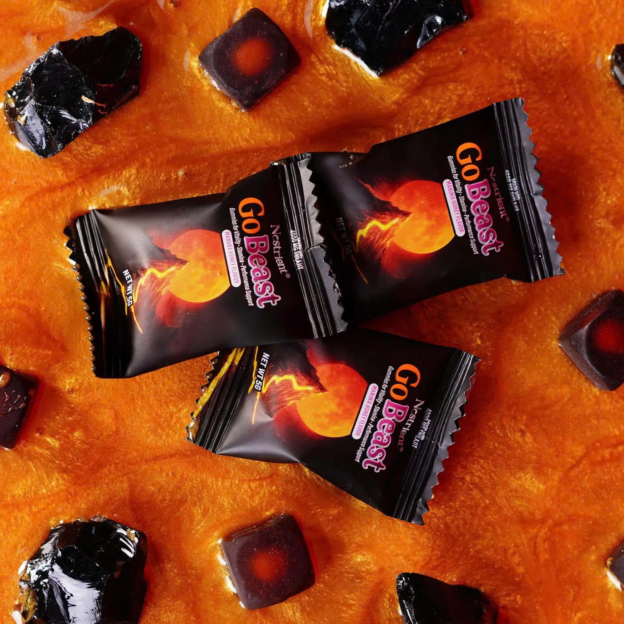 Nestrient GoBeast Shilajit Gummies with Manuka Honey flavor showing the gummy candies in a clear container.